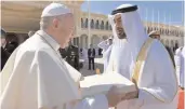  ?? — AFP ?? Pope Francis gifts Abu Dhabis Crown Prince Mohammed bin Zayed al- Nahyan a copy of Human Fraternity document before leaving on Tuesday.