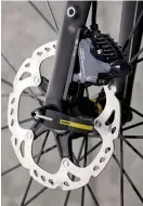  ??  ?? Below The Dolan’s disc brakes are new Shimano Ultegra R8000 items Bottom The rear dropouts are very neatly machined