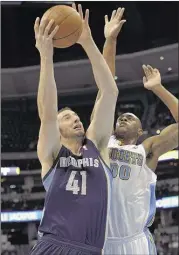  ?? ASSOCIATED PRESS ?? Kosta Koufos (left) was a solid backup for Grizzlies All-Star center Marc Gasol since Memphis acquired him in 2013. On Saturday, Koufos reached a $33 million deal with Sacramento.