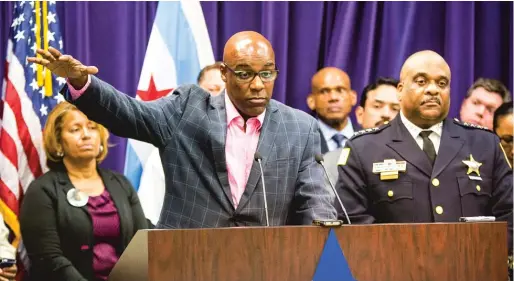  ?? JAMES FOSTER/ FORTHE SUN- TIMES ?? State Sen. Kwame Raoul and Police Supt. Eddie Johnson announcing legislatio­n in 2016 to target repeat gun offenders with harsher sentences.