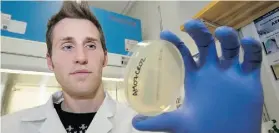  ?? GREG PENDER /Postmedia News ?? University of Saskatchew­an veterinary medicine researcher Joe Rubin discovered antibiotic-resistant bacteria in a squid brought to Saskatoon.