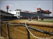  ?? PATRICK SEMANSKY - THE ASSOCIATED PRESS ?? FILE - In this May 15, 2018, file photo, preparatio­ns take place for the Preakness Stakes horse race at Pimlico Race Course in Baltimore. The future of Pimlico has turned into a tug of war involving city officials, who want it to stay in Baltimore, and the owners of the track, who long to move the second jewel of the Triple Crown to nearby Laurel.