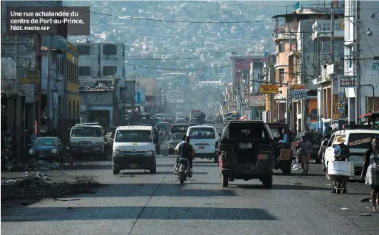  ?? PHOTO AFP ?? Une rue achalandée du centre de Port-au-prince, hier.