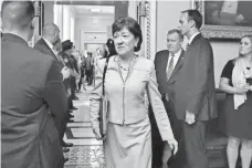  ?? JACQUELYN MARTIN, AP ?? Sen. Susan Collins, R-Maine, center, says she had been lobbied by President Trump, Vice President Pence and others.