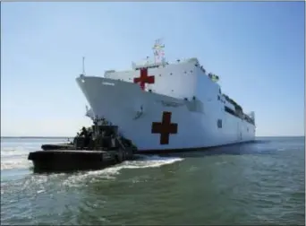  ?? BILL MESTA/U.S. NAVY VIA AP ?? The Military Sealift Command hospital ship USNS Comfort (T-AH 20) departs Naval Station Norfolk to support hurricane relief efforts in Puerto Rico, Friday, in Norfolk, Va. The Department of Defense is supporting the Federal Emergency Management Agency,...