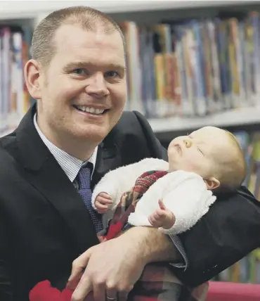  ?? PICTURE: SCOTT LOUDEN ?? 0 Alan Ferrier, of the National Records Of Scotland, with his daughter Megan