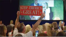  ?? MARIAN DENNIS — MEDIANEWS GROUP ?? A rally-goer holds up a sign that reads “Keep America Great” as the kickoff for the “Women for Trump” Coalition began Tuesday morning.