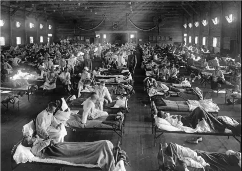  ?? COURTESY OF THE NATIONAL MUSEUM OF HEALTH AND MEDICINE, ARMED FORCES INSTITUTE OF PATHOLOGY ?? Influenza victims crowd into an emergency hospital near Fort Riley, Kan., in this 1918 photo. The Spanish flu hit Ottawa during an outbreak starting in 1918 that killed 500 people.
