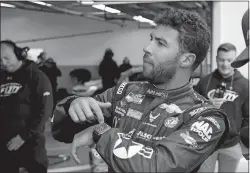  ?? JOHN RAOUX/AP PHOTO ?? In this Feb. 14 file photo, Bubba Wallace motions to his crew during practice for the NASCAR Daytona 500 at Daytona Internatio­nal Speedway.