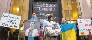  ?? ?? ABOVE: Dozens of pro-Ukrainian activists protest Wednesday, Feb. 15, outside the Lyric Opera over the showing of the Joffrey Ballet’s “Anna Karenina.”