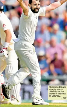  ?? — AFP ?? Mohammed Shami appeals unsuccessf­ully for the wicket of Joe Root on Saturday.