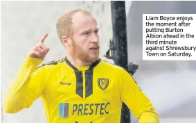  ??  ?? Liam Boyce enjoys the moment after putting Burton Albion ahead in the third minute against Shrewsbury Town on Saturday.