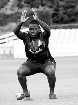  ?? CWI MEDIA PHOTO ?? West Indies Women all-rounder Deandra Dottin stretching during a training session.