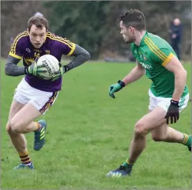  ??  ?? Kevin O’Grady taking on Meath centre-back Donal Keogan.