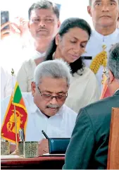  ??  ?? President Gotabaya Rajapaksa being sworn in at Ruvanwelis­eya on Monday. Pix by Indika Handuwala and Amila Gamage