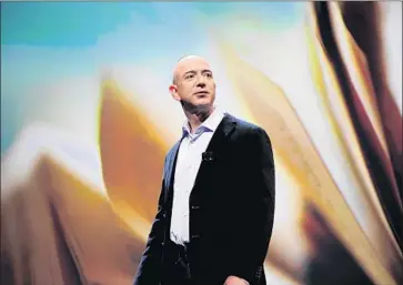  ?? Emmanuel Dunand AFP/Getty Images ?? AMAZON CEO Jeff Bezos, pictured in 2011, had largely been invisible in the world of philanthro­py before his announceme­nt Thursday. The move comes as Amazon faces scrutiny over its power and effect on the economy.