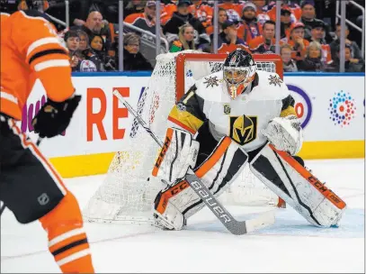  ?? Curtis Comeau ?? The Associated Press Goaltender Dylan Ferguson’s lone NHL appearance came in a Nov. 14 loss at Edmonton when he played 9:14 and faced two shots, stopping one. His save came against superstar center Connor Mcdavid.