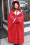  ?? LAUREN HALLIGAN — LHALLIGAN@ TROYRECORD.COM ?? Laura Darling of Laura Darling Law dresses in red at the 35th annual Troy Victorian Stroll on Sunday in downtown Troy.