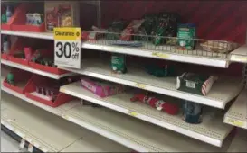  ?? BRIANA CONTRERAS — THE MORNING JOURNAL ?? Christmas merchandis­e appears scarce on the shelves at Amherst’s Target, 8000 Oak Point Road during their after Christmas sales, Dec. 26.