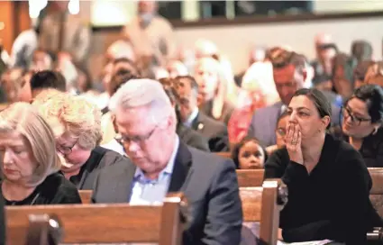  ?? SARAH PHIPPS/THE OKLAHOMAN ?? People observe 168 seconds of silence during the 2023 Remembranc­e Ceremony at the First Church in Oklahoma City.