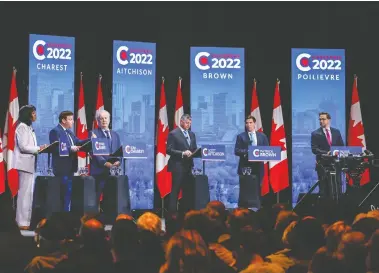  ?? JEFF MCINTOSH / THE CANADIAN PRESS ?? Conservati­ve leadership candidates, from left, Leslyn Lewis, Roman Baber, Jean Charest, Scott Aitchison, Patrick
Brown and Pierre Poilievre are grilled at the party's English leadership debate in Edmonton on Wednesday.