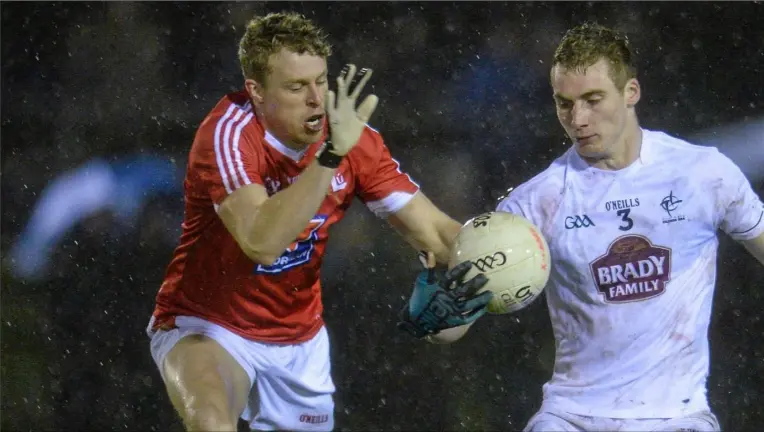  ??  ?? Jim McEneaney challenges Luke Flynn during last year’s O’Byrne Cup clash between Louth and Kildare. Colin Kelly is looking to build similar momentum this year.
