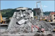  ?? AP/LUCA ZENNARO ?? A view of the collapsed Morandi highway bridge in Genoa, Italy, on Sunday.