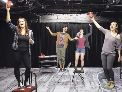  ?? Brett Coomer / Houston Chronicle ?? Christina Stroup, from left, Dylan Godwin, Kathryn Porterfiel­d and Julia Krohn star in the TUTS Undergroun­d production of “The Sweet Potato Queens.”