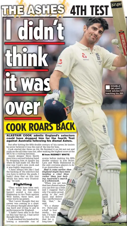  ??  ?? DOUBLE DELIGHT: Cook salutes reaching his 200
