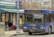  ?? FILE PHOTO ?? Riders wait for the bus at the CDTA Uncle Sam Bus Stop in Troy.