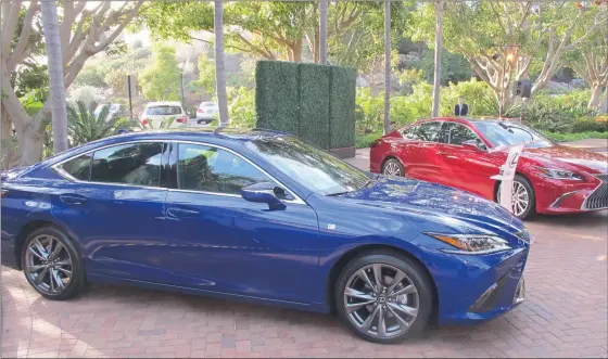  ??  ?? The 2019 Lexus ES 350 F Sport (foreground) and ES 350 launch the brand’s seventh-generation mid-size luxury sedan the goes on sale in September.