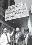  ?? AP ?? New York city mayor Ed Koch (left) points to the renamed marquee of Alvin Theatre to Neil Simon Theatre in 1983.