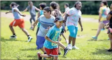  ?? / Rome City Schools ?? West Central Elementary student Jason Cruz runs during Rome City Schools Running Club practice.