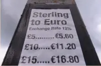  ?? (Clodagh Kilcoyne/Reuters) ?? A STERLING TO EURO exchange rate sign.