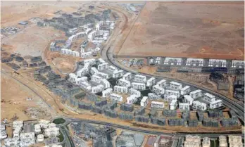  ?? — Reuters ?? An aerial view of the constructi­on site in the New Administra­tive Capital (NAC) east of Cairo.