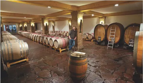  ??  ?? Above: Christian Dautel in the family’s barrel cellar, where he opts to use casks of 300-litre capacity and larger