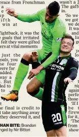  ??  ?? MORE BARK THAN BITE: Brandon Barker is challenged by Nir Bitton