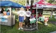  ??  ?? BHGRE Gary Greene’s Susan Matson and Diane Moss hosted a National Night Out event in Gleannloch Farms.