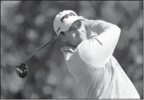  ?? WILFREDO LEE/THE ASSOCIATED PRESS ?? Michael Thompson focuses on his tee shot during the final round of the Honda Classic. Thompson shot 69 to finish first.