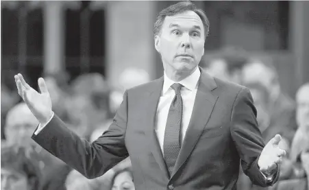  ?? ADRIAN WYLD, THE CANADIAN PRESS ?? Minister of Finance Bill Morneau reacts to a question in the House of Commons Thursday.