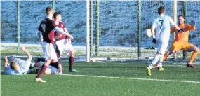  ??  ?? Equaliser Shotts defenders can only look on as Ryan Connelly levels for Gartcairn (Pic by Duncan Darragh)