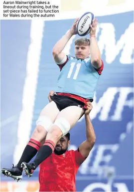  ??  ?? Aaron Wainwright takes a lineout during training, but the set-piece has failed to function for Wales during the autumn