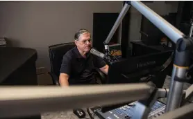  ?? Staff photo by Kelsi Brinkmeyer ?? Frank Miller, KTXK radio DJ, sits at his work station at the Texarkana College Media Center. Miller hosts “Adventures in Jazz” every Saturday. Miller took over the show after the passing of Jerry Atkins, a Texarkana institutio­n for all things jazz
for many years.