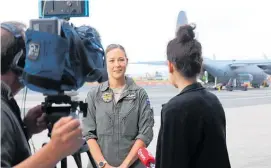  ?? ?? Flight Lieutenant Michal-Louise Paget tells television news media the purpose of the exercise.