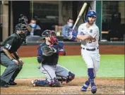  ?? Robert Gauthier Los Angeles Times ?? THE DODGERS’ Cody Bellinger strikes out in the fourth against Atlanta’s Max Fried, who fanned nine.