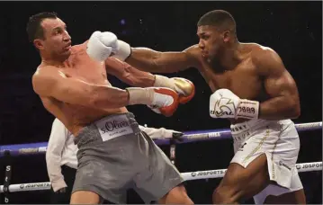  ??  ?? Wladimir Klitschko and Anthony Joshua