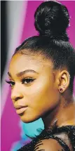  ?? FRAZER HARRISON/GETTY IMAGES ?? TOP KNOT Normani Kordei of Fifth Harmony sports the classic look.