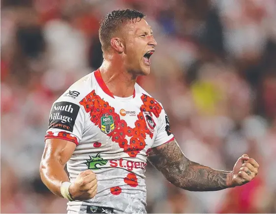  ?? Picture: GETTY IMAGES ?? A pumped-up Tariq Sims celebrates the Dragons’ victory over the Sydney Roosters in the Anzac Day clash.