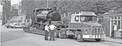  ?? ?? ● The train on the lorry with a puncture behind the Town Hall in the 1980