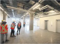  ?? VINCE TALOTTA/TORONTO STAR ?? Visitors get a tour of the second floor of the new Museum of Contempora­ry Art Toronto Canada. It’s still a constructi­on zone and won’t open till Sept. 22.